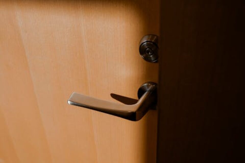 Close-up of a modern door handle and latch